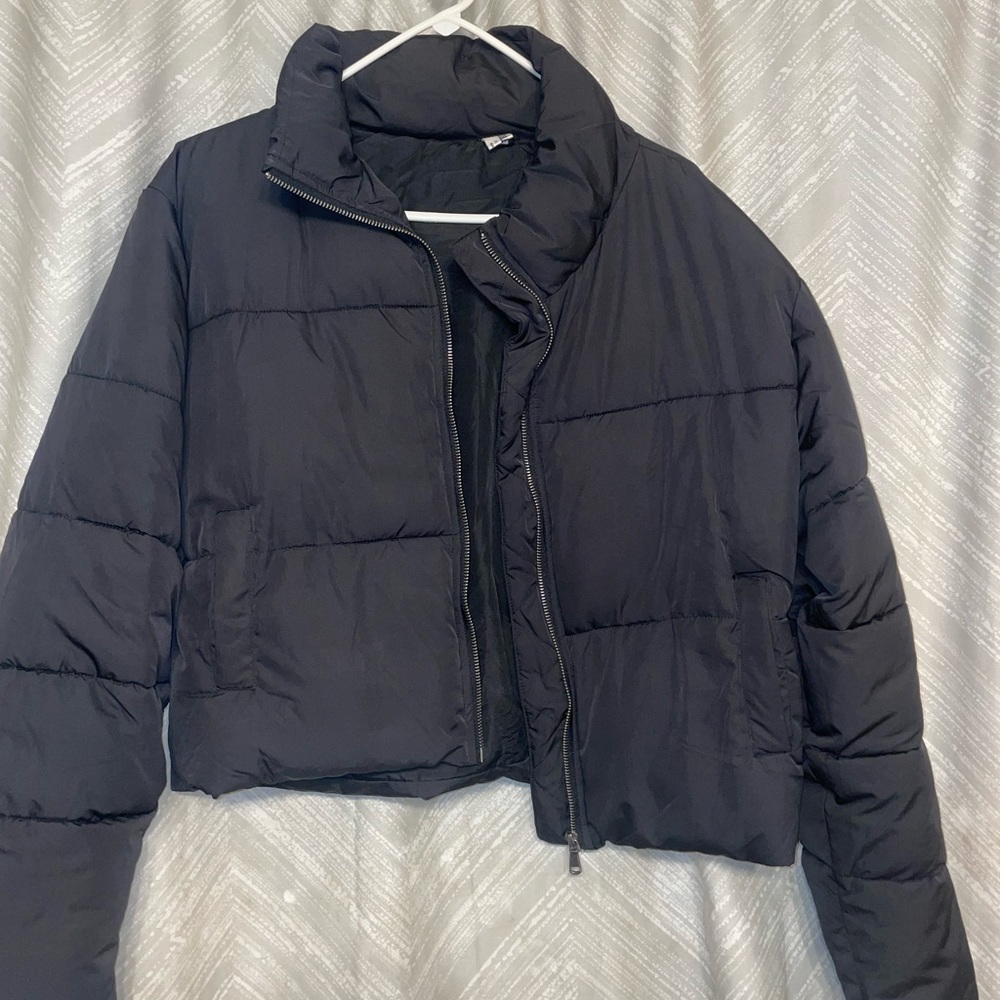 Black puffer coat.